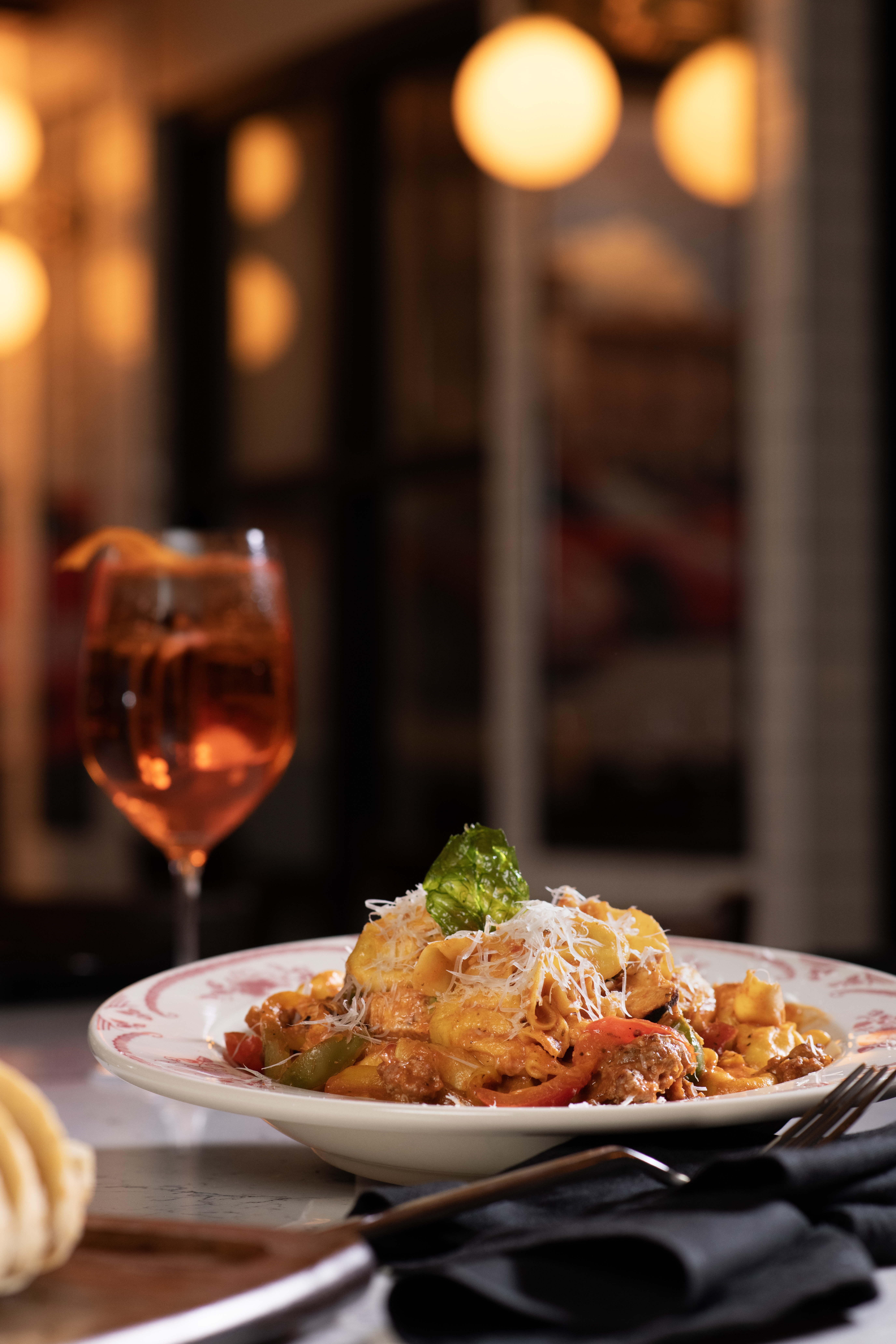 Cheese stuffed purses, chicken, Italian sausage, bell peppers, housemade marinara